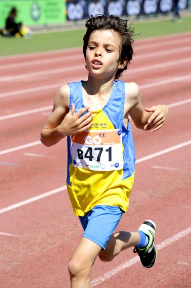 XVIII Trofeo de Atletismo Colegio Base -Primer plano de un corredor infantil.