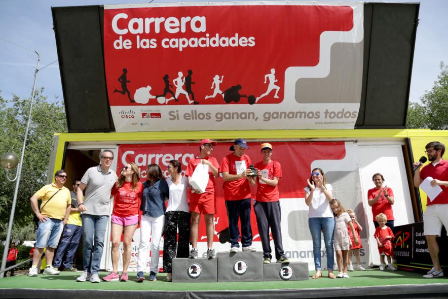 Carrera de las Capacidades -  Pódium  con los ganadores.