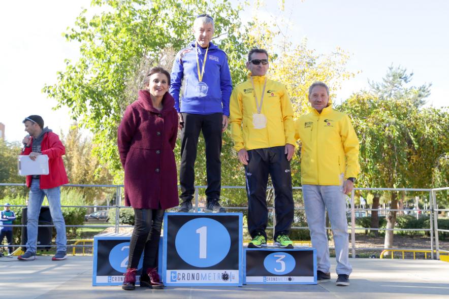 Carrera Rápida Rey de las Populares - Imagen del pódium con los tres premiados.