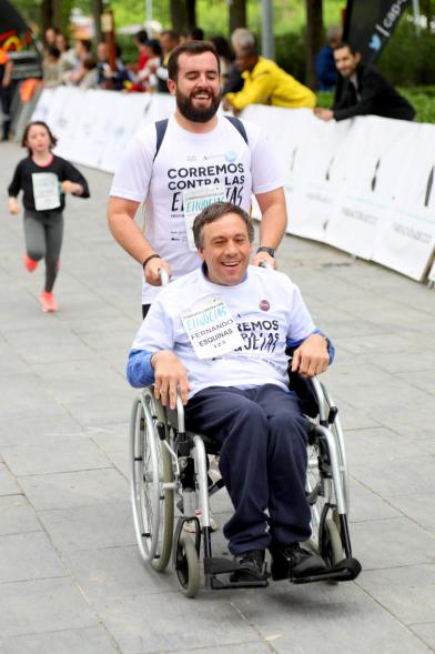 Carrera de las Capacidades 2018 - Un corredor con su monitor.