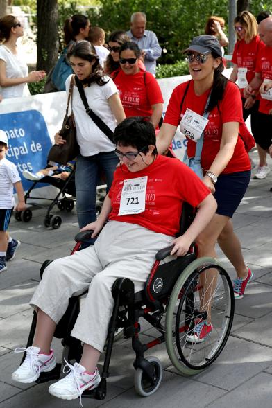 Carrera de las Capacidades -  Corredora con su monitor.