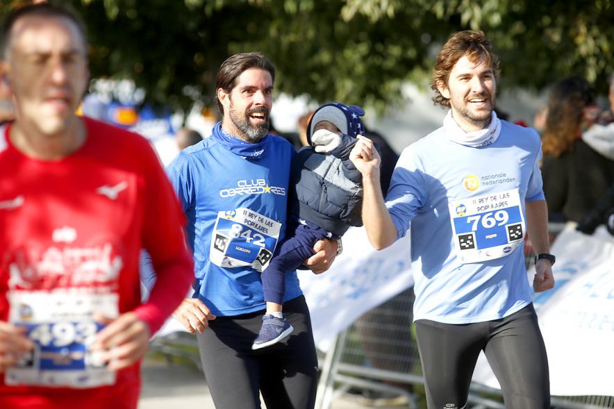 IIª Carrera Rey de las Populares - Primer plano de tres corredores  y un bebe.