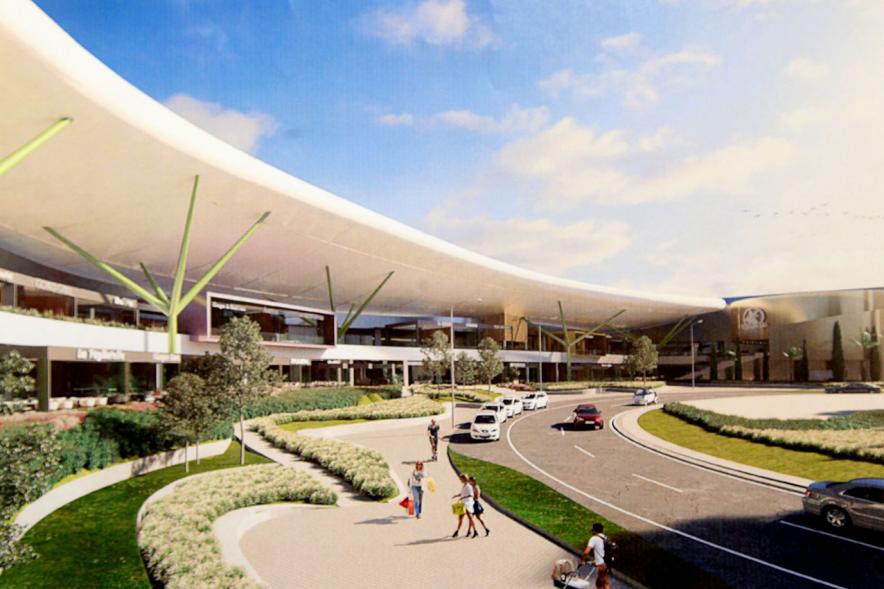 Imagen creada digitalmente del centro Heron City Diversia, con nuevas zonas ajardinadas
