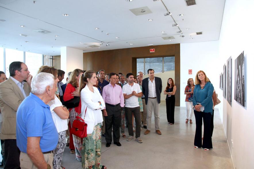 Asistentes en la exposición,. 