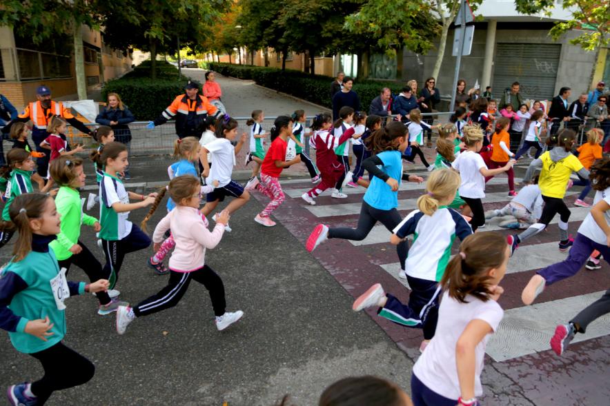 Milla Escolar 2018 -  Imagen de los niños corriendo. 