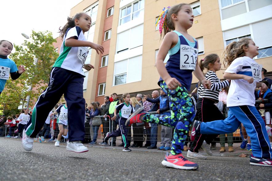 Milla Escolar 2018 - Primer plano de las niñas corriendo.