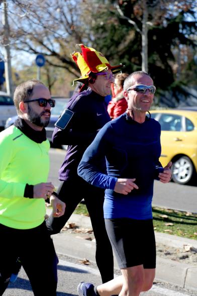 San Silvestre 2018 - Primer plano de dos  corredores.