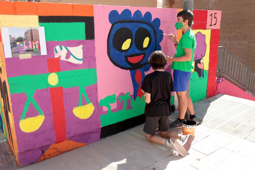 Taller de Graffiti  - Imagen de jóvenes pintando.