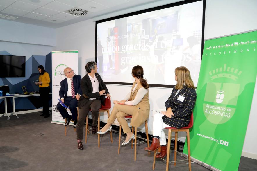 Vº Encuentro de Comercio Urbano - Imagen de un momento de una de las charlas de los encuentros.