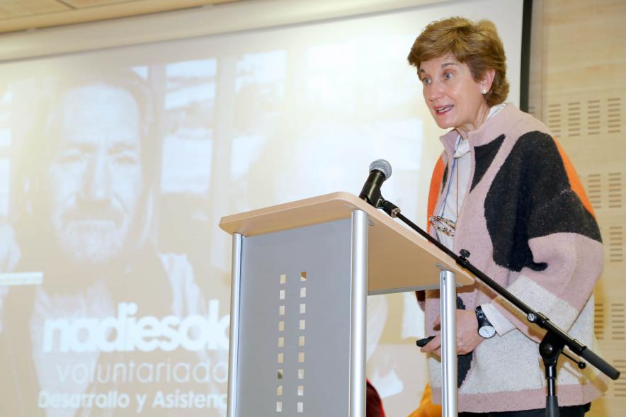 detalle, plano medio cuerpo, participante a la Presentación del Programa de Voluntariado 