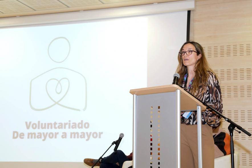 detalle, plano medio cuerpo, participante a la Presentación del Programa de Voluntariado 