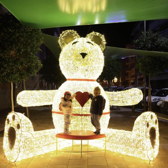 Encendido de las luces de Navidad, oso iluminado
