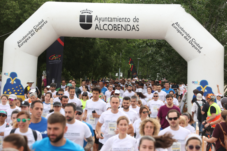 XVI Carrera de las Capacidades, participantes corriendo